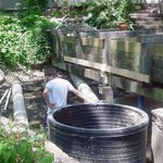 Preparing to cut hole  in pit for penstock